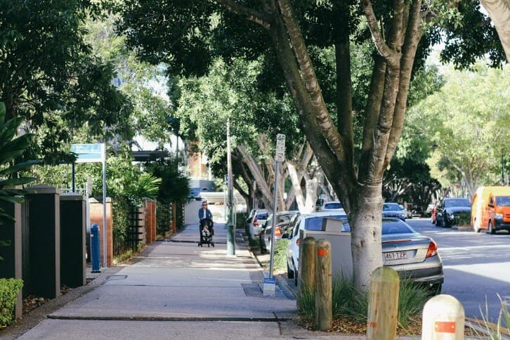 A leafy inner-Brisbane street of homes, the kind our clients compare and finance