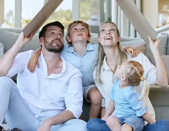 A family at home after settling their AMP home loan
