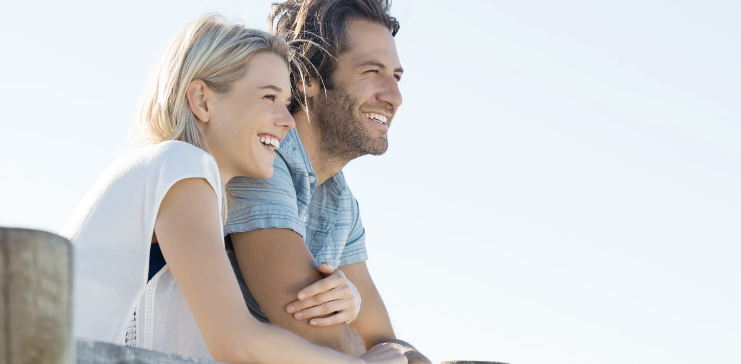 A happy couple discussing their Bendigo Bank home loan options