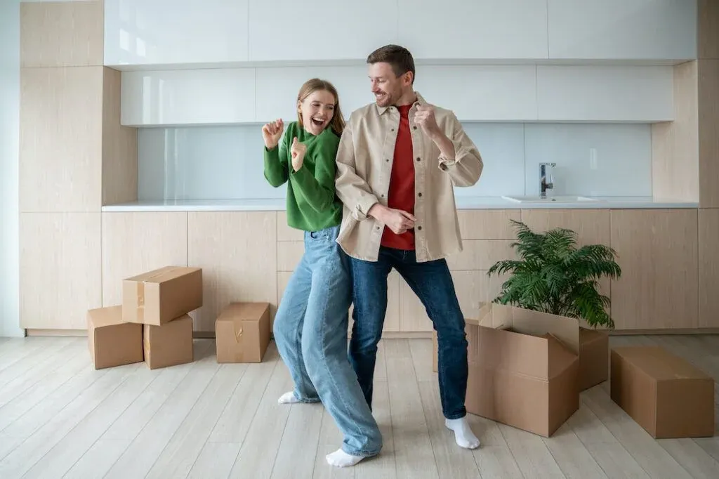 Buyers receiving keys to a home