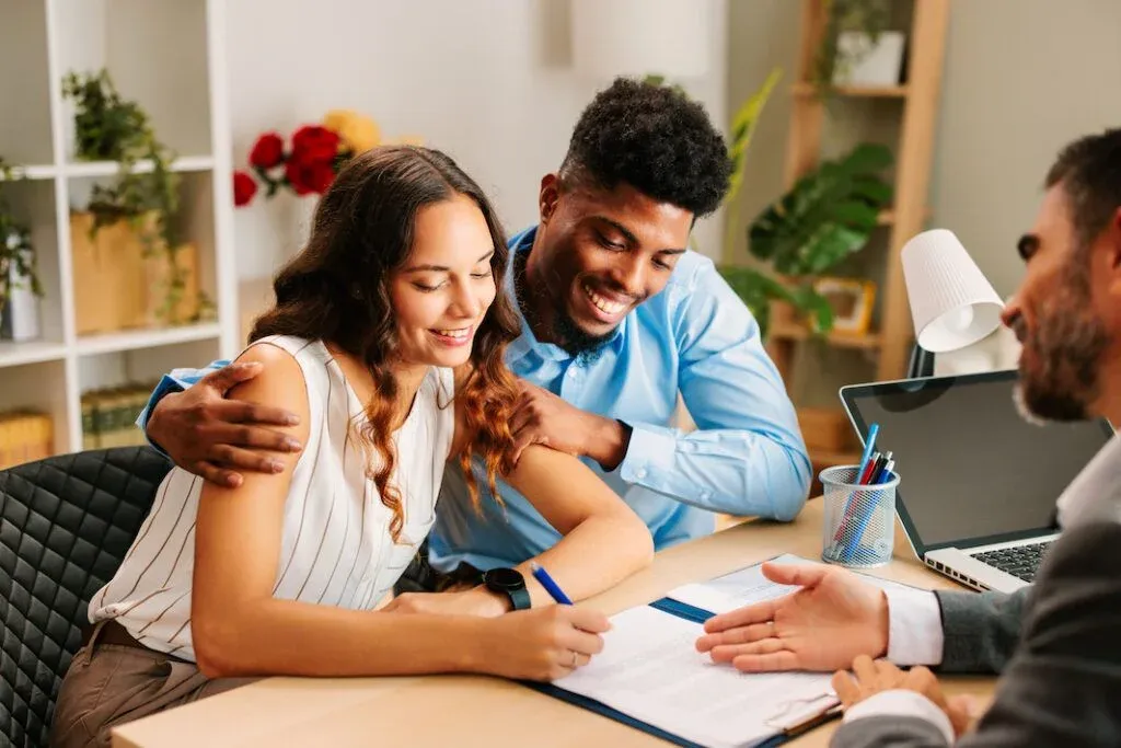 Home buyer checking realistic finance timing with a mortgage broker