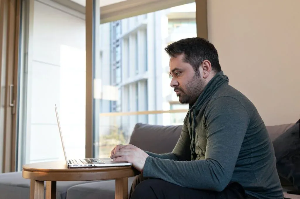 A person checking their banking on a laptop
