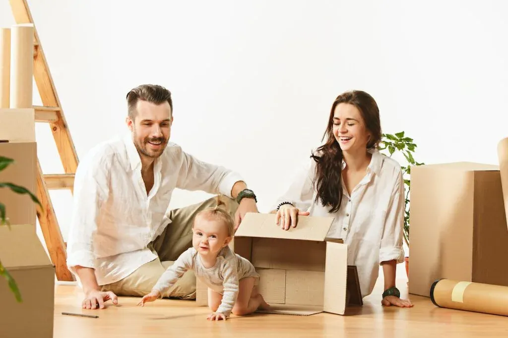 A family unpacking boxes in a home