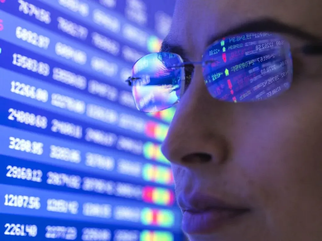 A person looking at market information