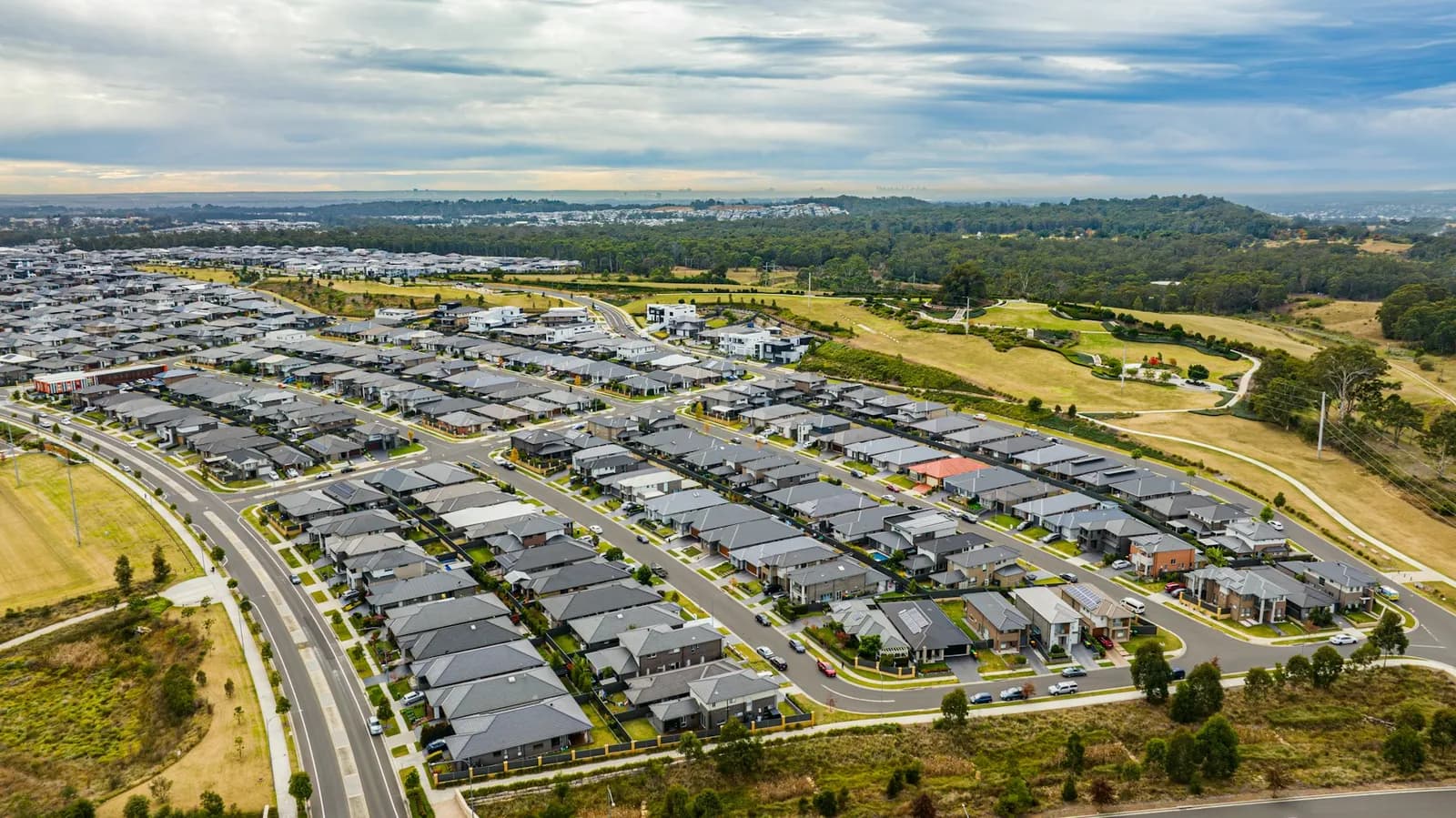 Rows of homes and residential streets in a Sydney housing estate.