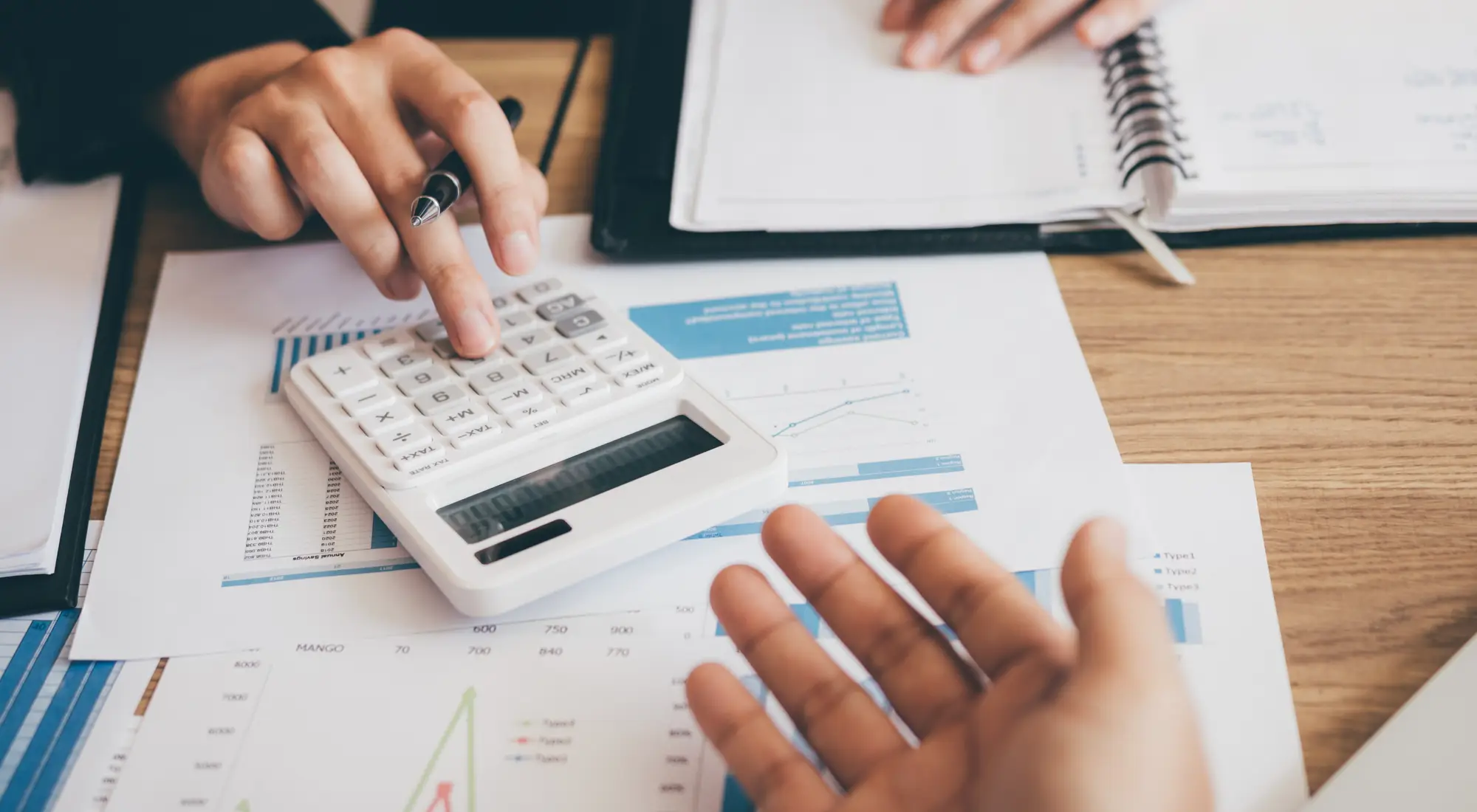 A person checking their property buying eligibility on a laptop
