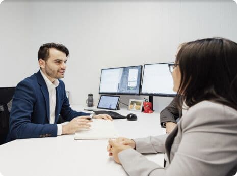 A borrower meeting with a Brisbane mortgage broker to discuss an HSBC home loan