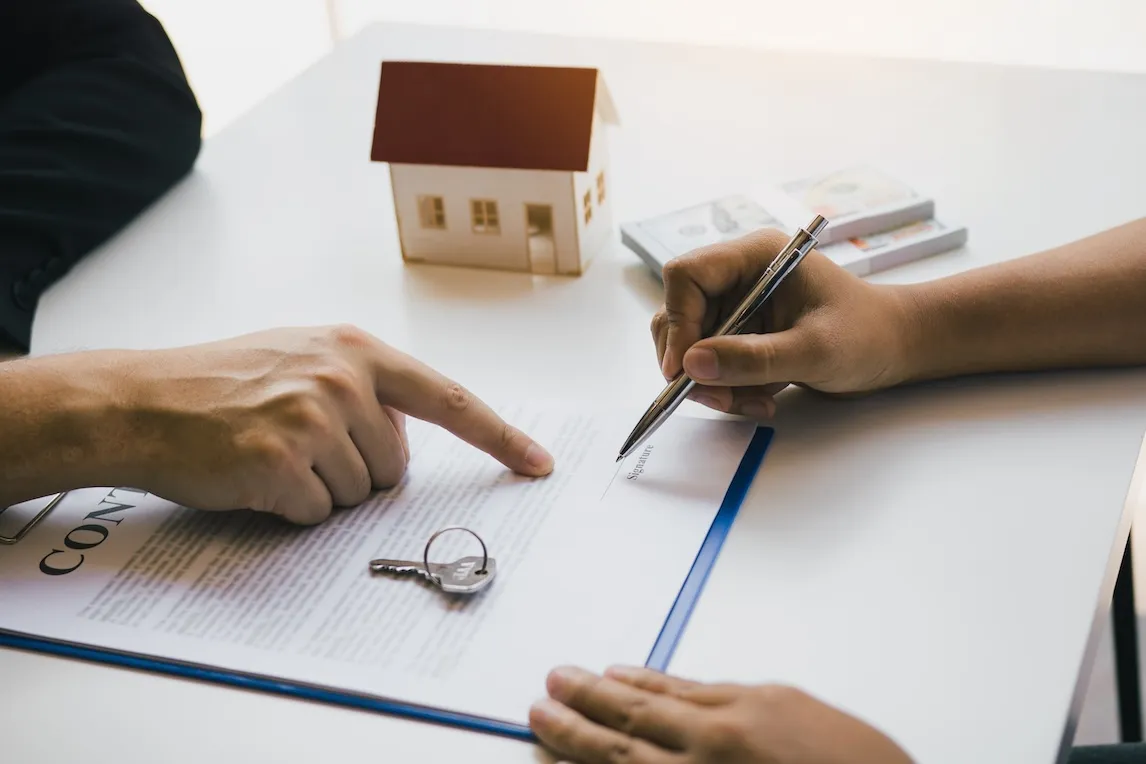 Signing a contract of sale